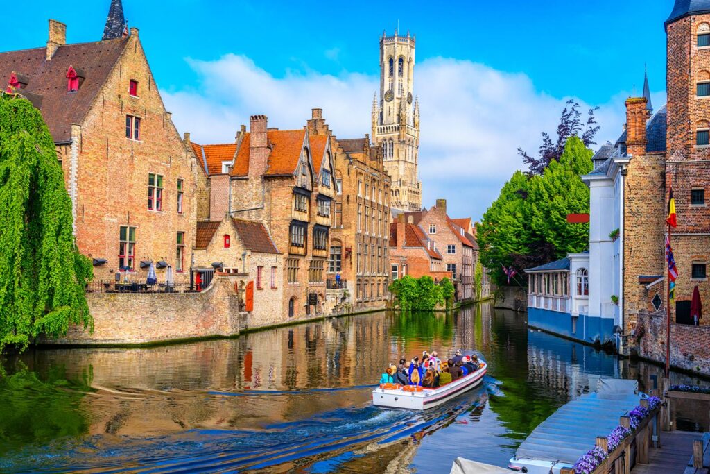 Classic view of the historic city center with canal in Brugge, West Flanders province, Belgium. Cityscape of Brugge.